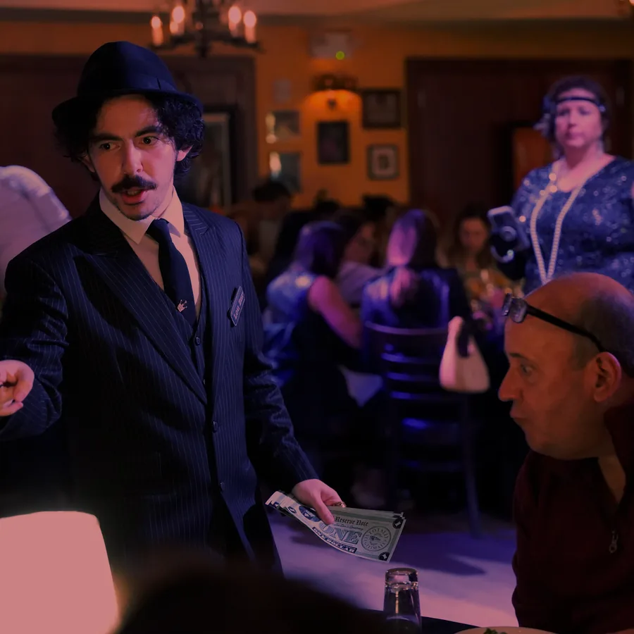 A Murder Mystery Company actor working the room at a San Diego show