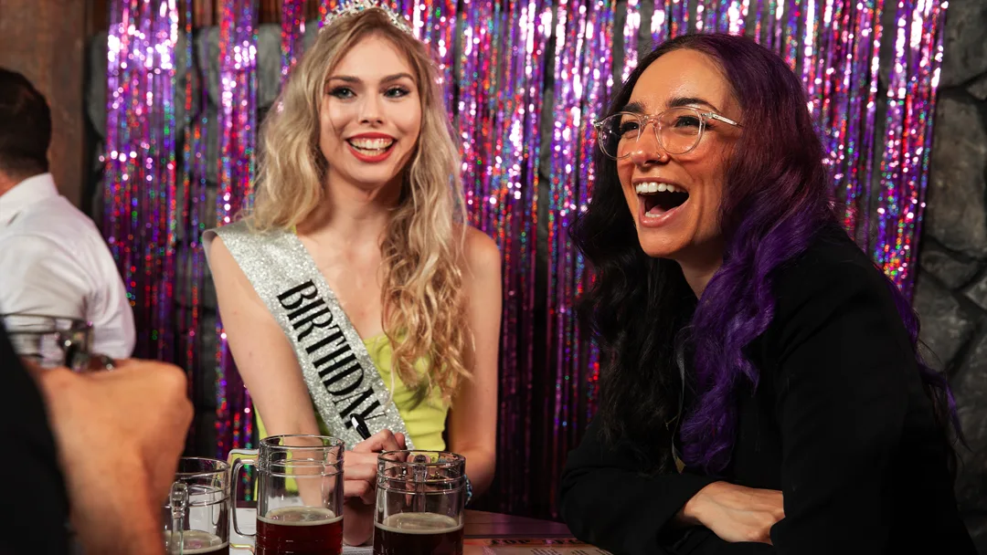 Guests celebrating at a San Diego murder mystery party