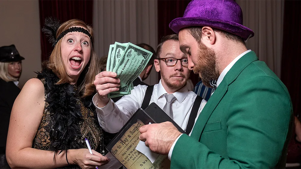 Guests enjoying a San Diego murder mystery party